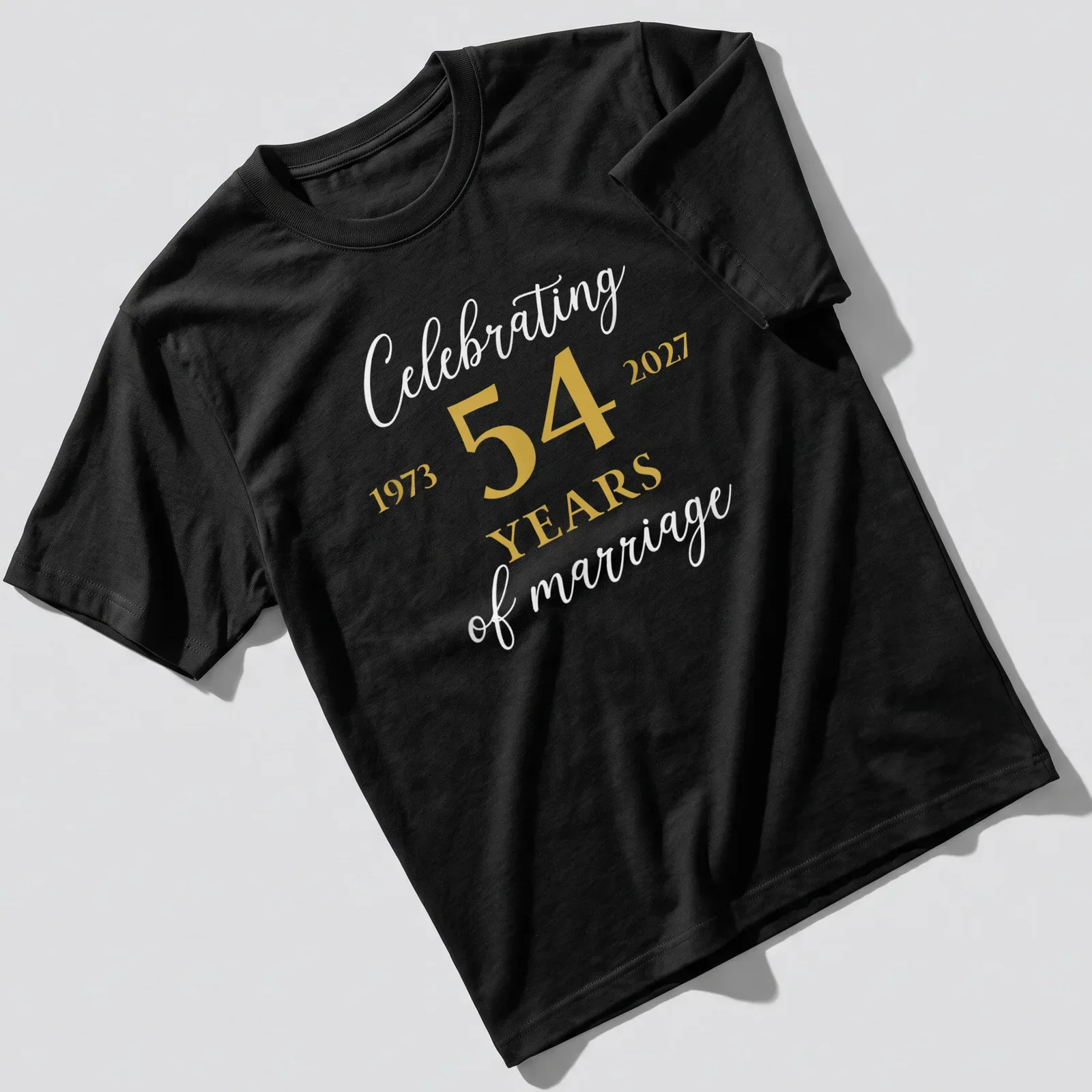 Elegant shirt celebrating 54 years of marriage with gold and white lettering. — printed on a unisex t-shirt