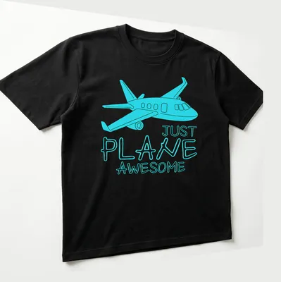 Cartoon airplane design with the phrase Just Plane Awesome in light blue and turquoise — printed on a unisex t-shirt (angled view)
