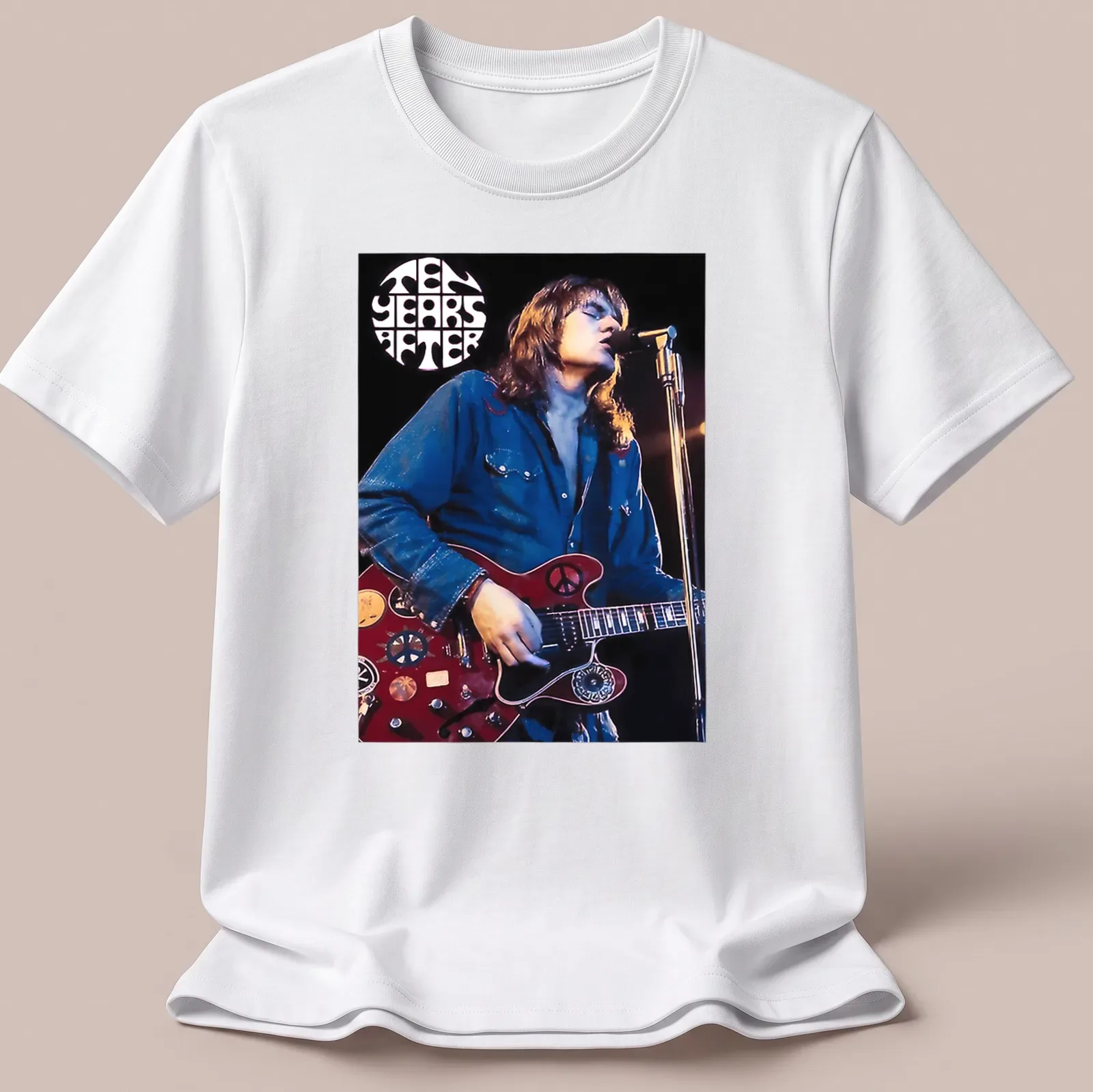 Vintage concert poster style tee featuring Alvin Lee playing guitar with text TEN YEARS AFTER — printed on a unisex t-shirt