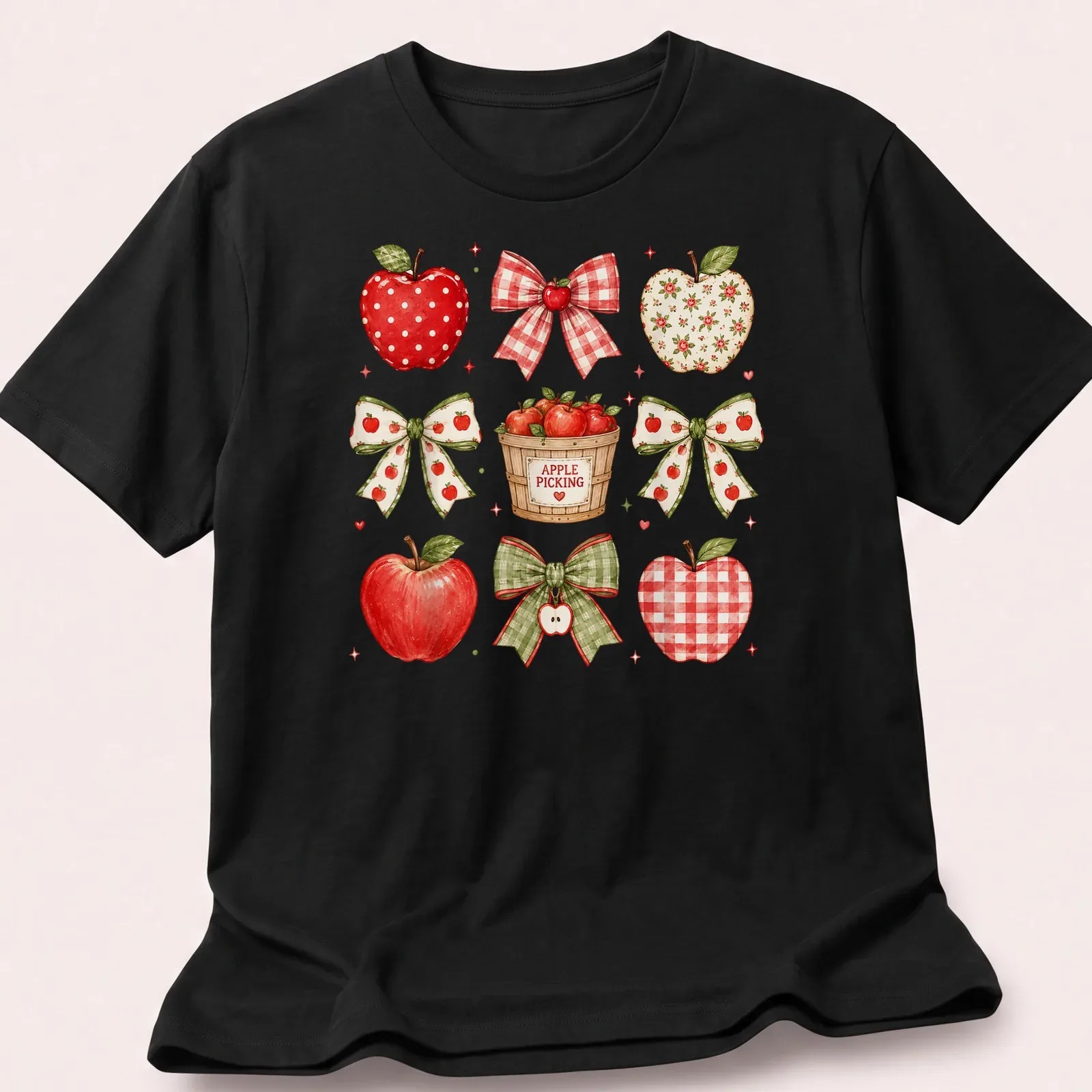 Watercolor print of red apples and bows with 'APPLE PICKING' text — printed on a unisex t-shirt