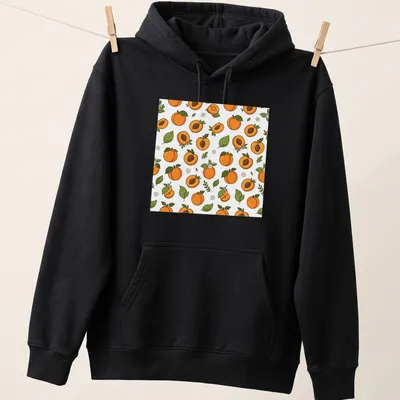 Seamless pattern featuring illustrated apricot fruit in orange and green. — printed on a unisex hoodie