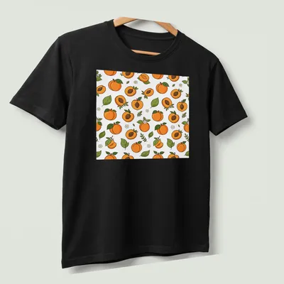 Seamless pattern featuring illustrated apricot fruit in orange and green. — printed on a unisex t-shirt (angled view)