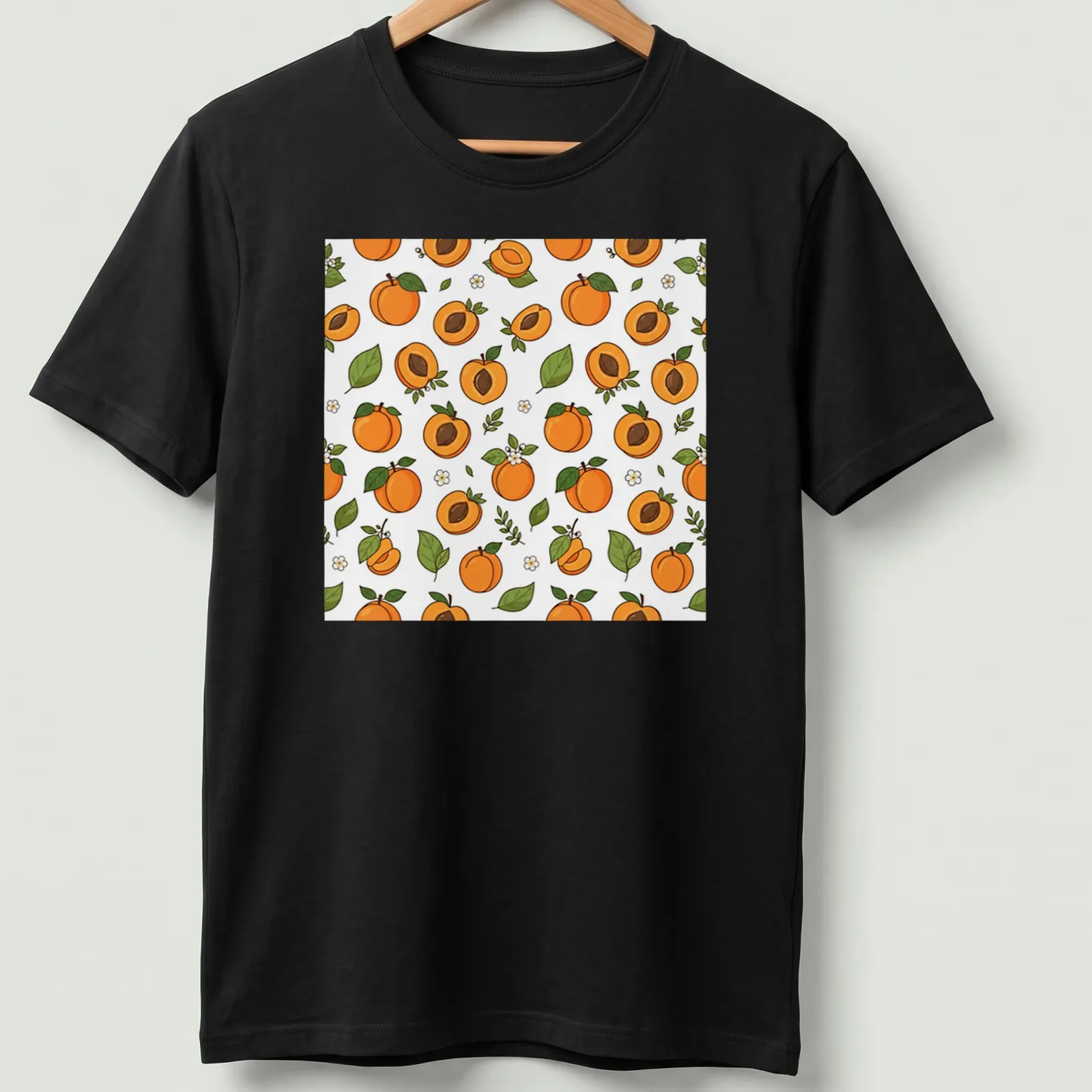 Seamless pattern featuring illustrated apricot fruit in orange and green. — printed on a unisex t-shirt
