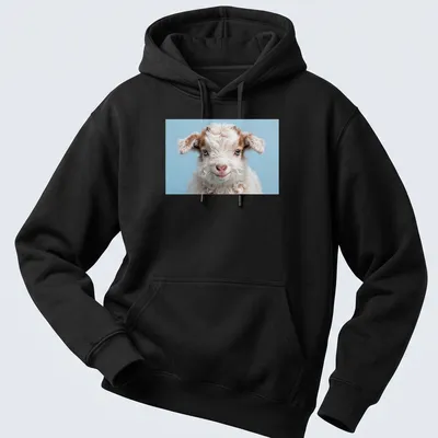 Photorealistic t-shirt design featuring a playful baby goat in white and brown against a light blue background. — printed on a unisex hoodie