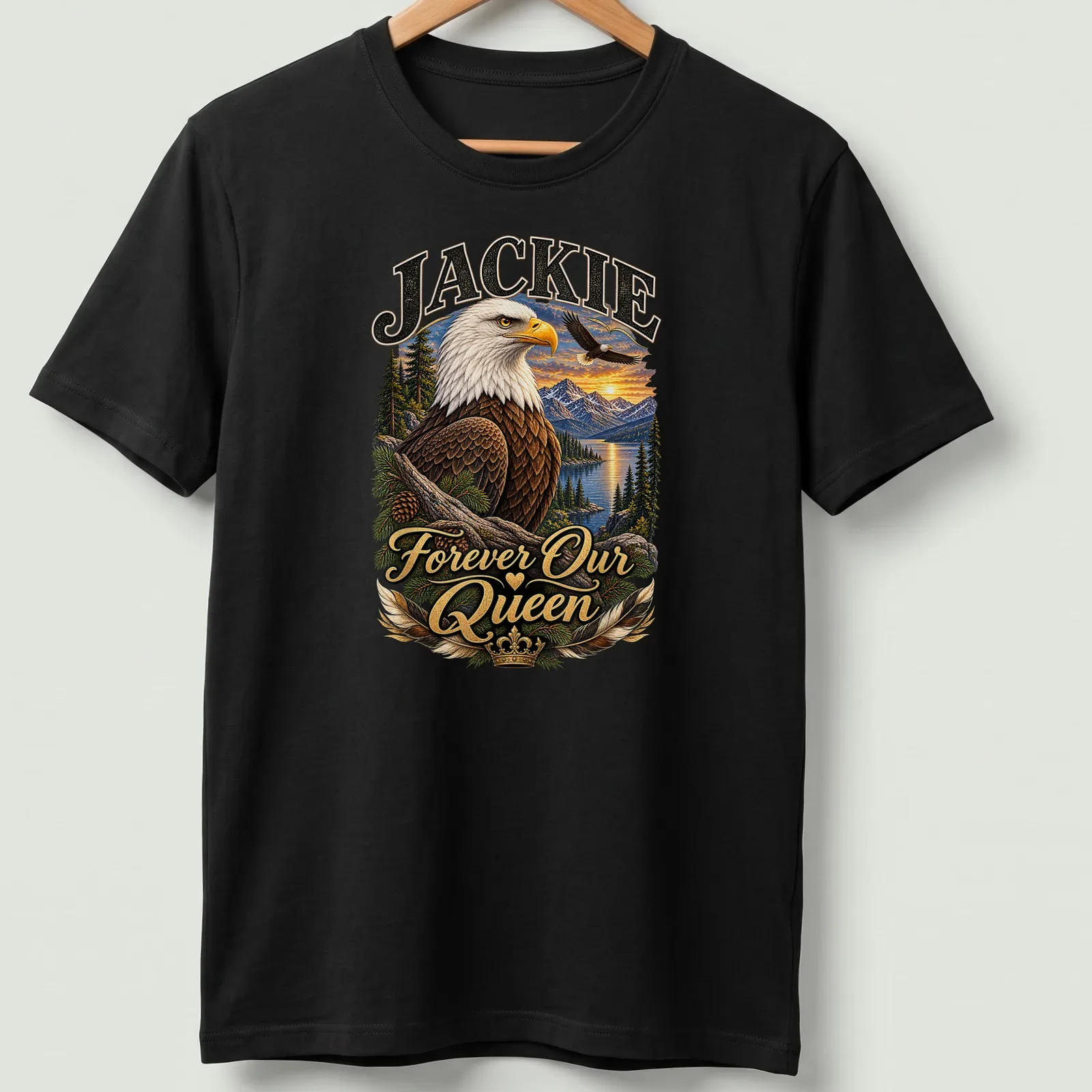 Realistic print of a bald eagle with text 'Jackie Forever Our Queen' in rich colors — printed on a unisex t-shirt