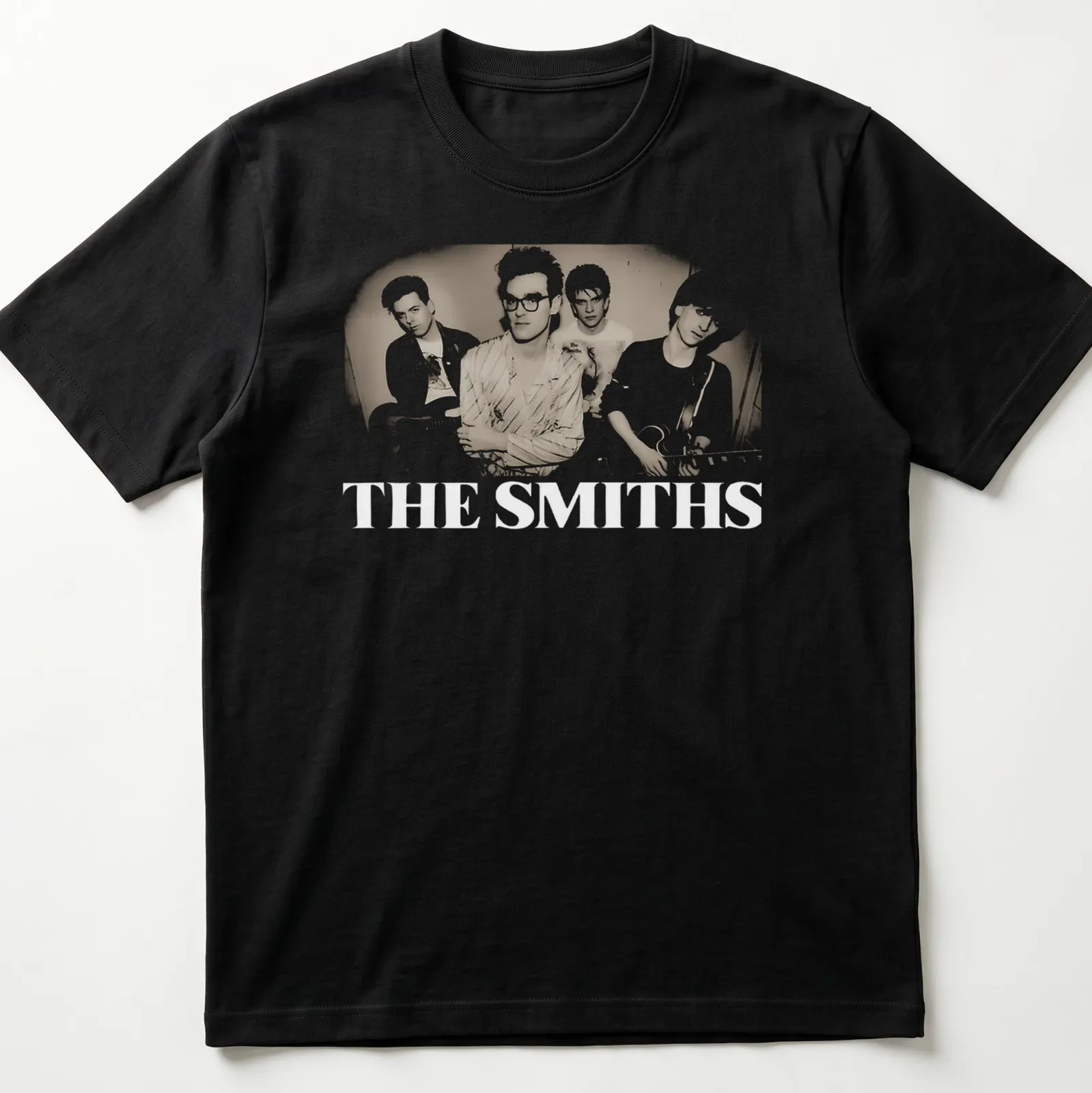 Vintage style t-shirt featuring four band members in nostalgic colors. — printed on a unisex t-shirt