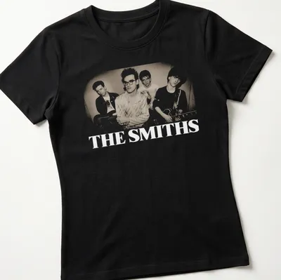 Vintage style t-shirt featuring four band members in nostalgic colors. — printed on a women's shirt