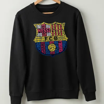 Typography print featuring Barcelona FC legends and crest in blue, yellow, red, and black — printed on a unisex sweatshirt