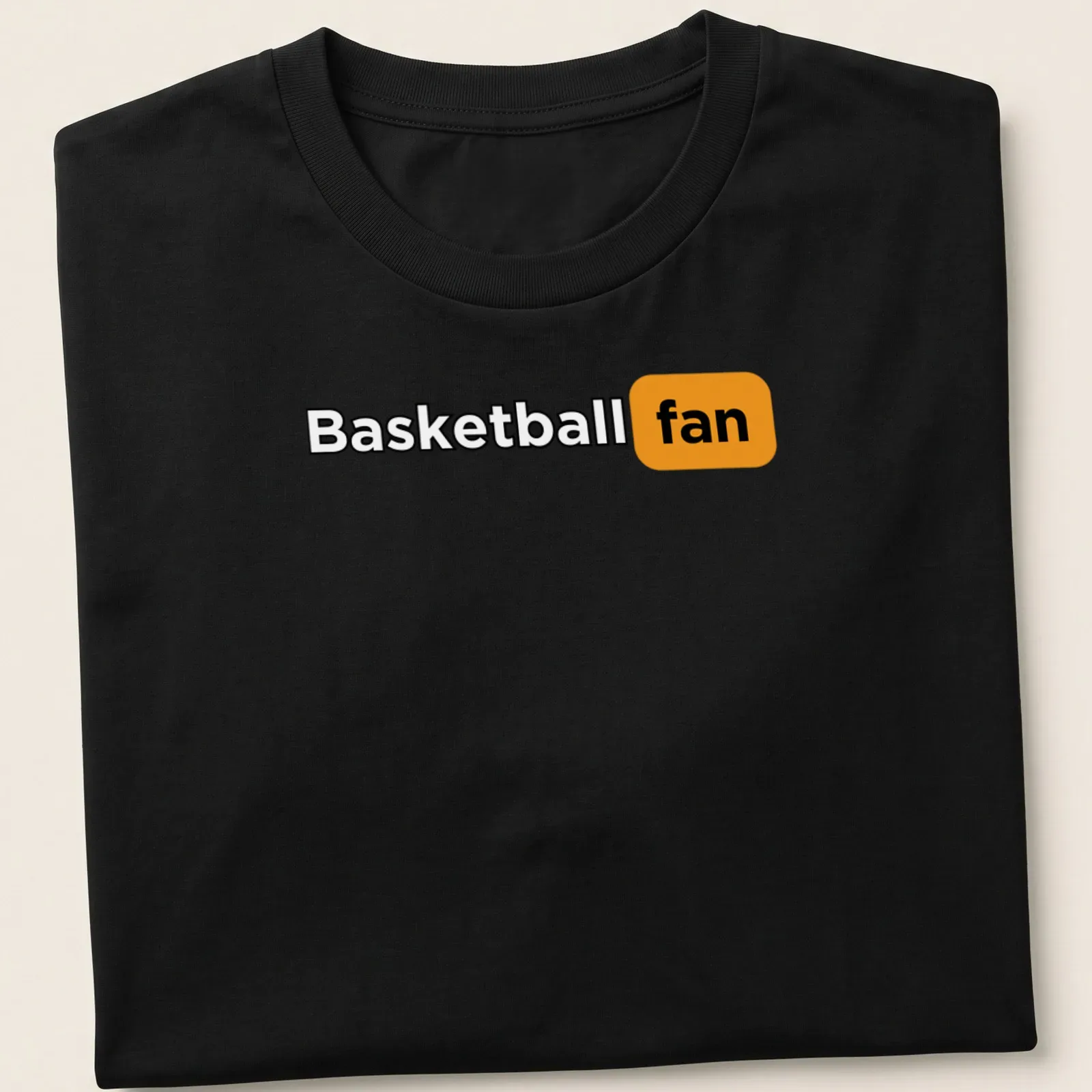 Bold Basketball Fan t-shirt with modern typography in black, orange, and white — printed on a unisex t-shirt