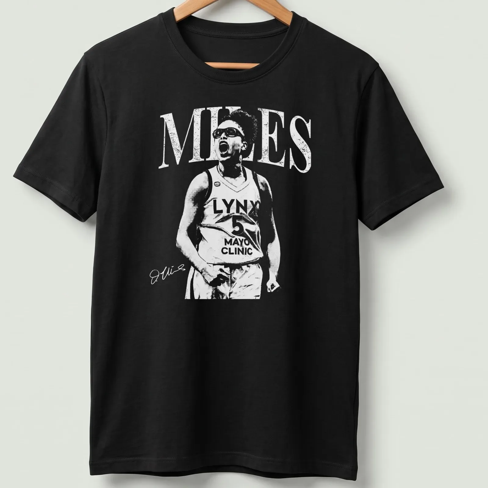 Sporty t-shirt featuring Olivia Miles name in bold typography with basketball theme — printed on a unisex t-shirt
