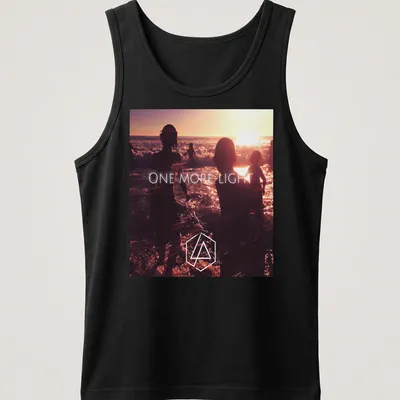 Photographic print of beach silhouettes with 'ONE MORE LIGHT' text in sunset colors. — printed on a tank top