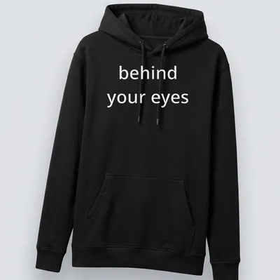 Script font T-shirt with the phrase 'behind your eyes' inviting introspection — printed on a unisex hoodie