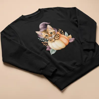 Watercolor Bengal cat in a pumpkin witch hat surrounded by autumn leaves — printed on a unisex sweatshirt