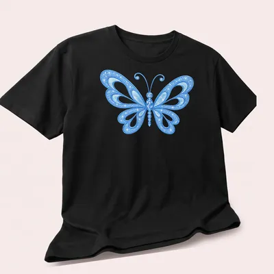 Detailed illustration of a blue butterfly on a light background — printed on a unisex t-shirt (angled view)