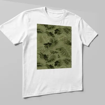 Seamless pattern of green leaves and flowers on a botanical-themed — printed on a unisex t-shirt (angled view)