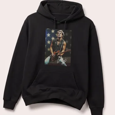 Vintage style t-shirt featuring Bruce Springsteen playing guitar in nostalgia-inspired colors. — printed on a unisex hoodie