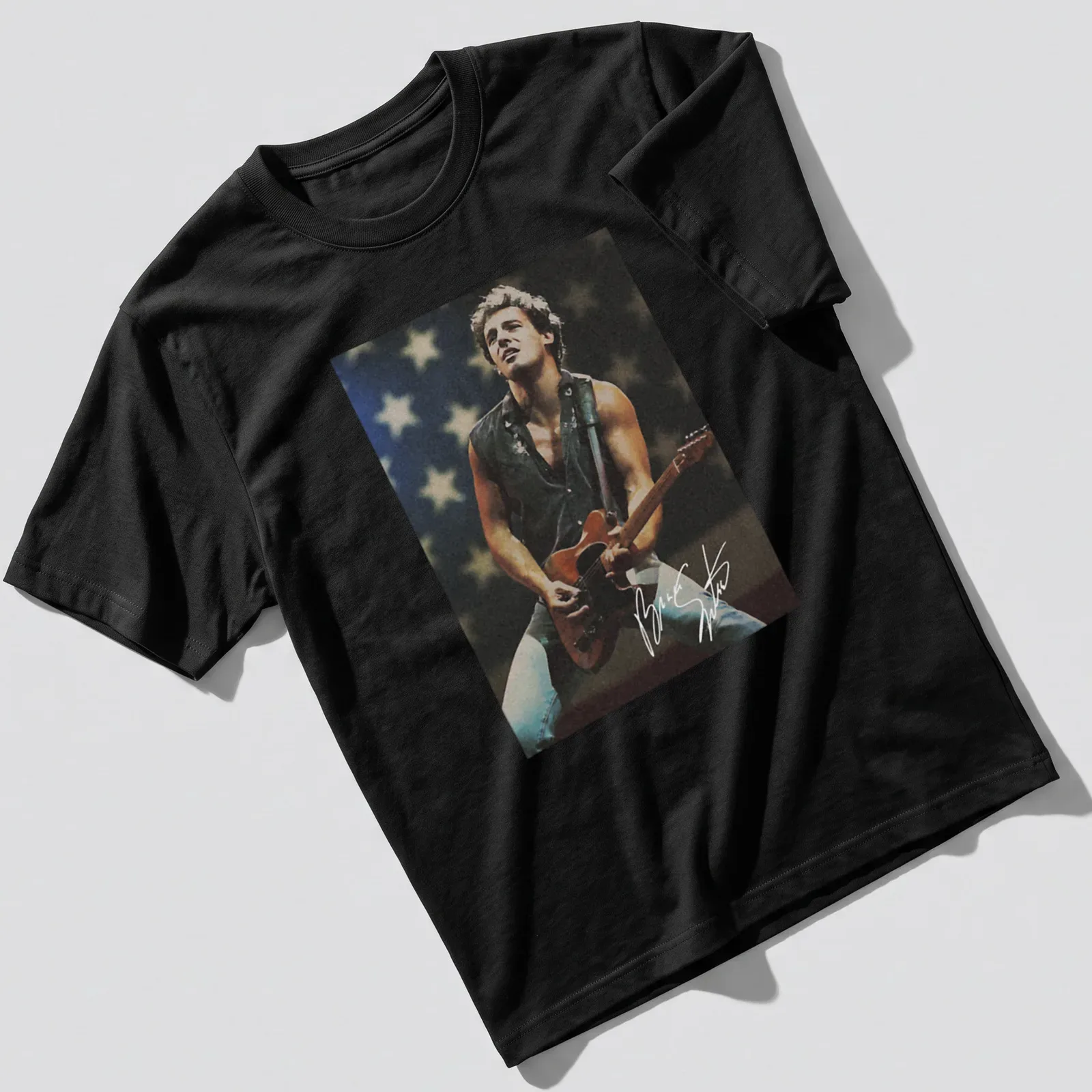 Vintage style t-shirt featuring Bruce Springsteen playing guitar in nostalgia-inspired colors. — printed on a unisex t-shirt