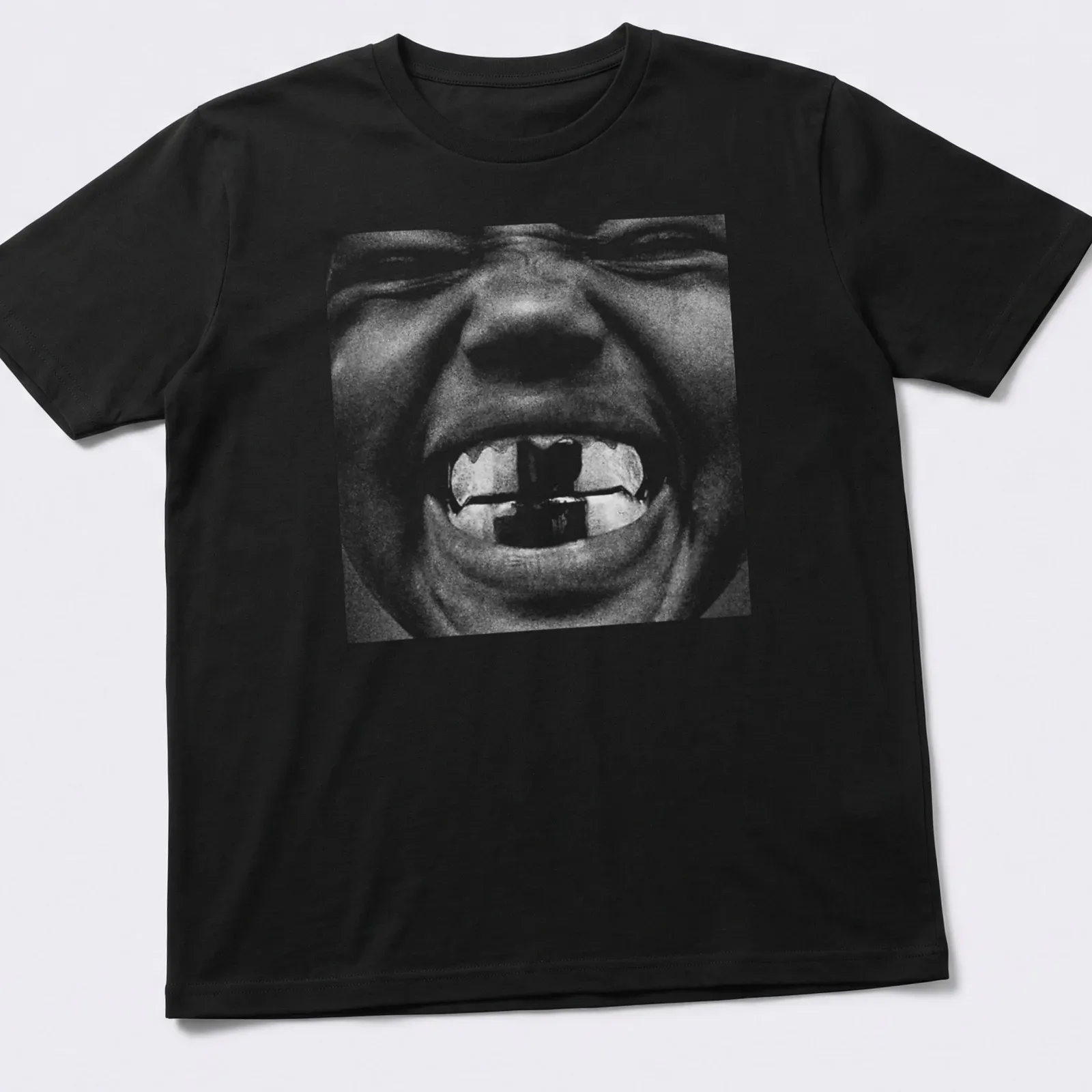 High-contrast monochrome t-shirt featuring the text Bully and an illustration of Kanye West — printed on a unisex t-shirt
