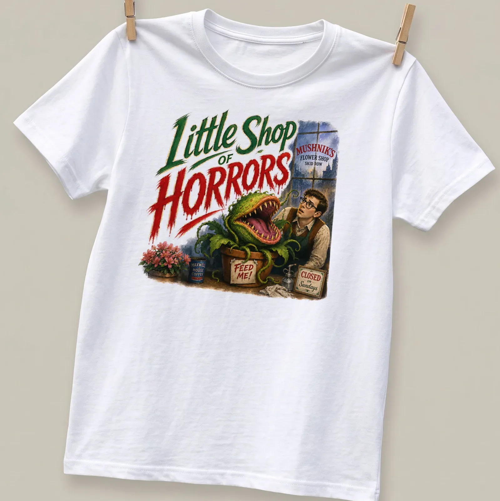 Vintage illustration of a carnivorous plant with text referencing Little Shop Of Horrors — printed on a unisex t-shirt