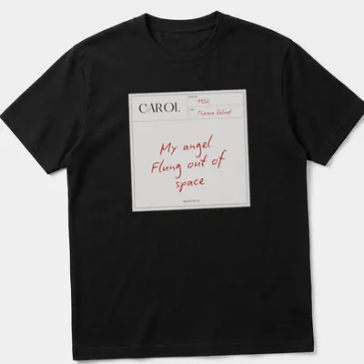 Minimalist t-shirt featuring white text saying 'My angel Flung out of space' on a red background