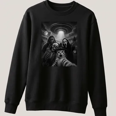 A humorous depiction of a cat taking a selfie with Bigfoot, skeleton, and alien in black and white — printed on a unisex sweatshirt
