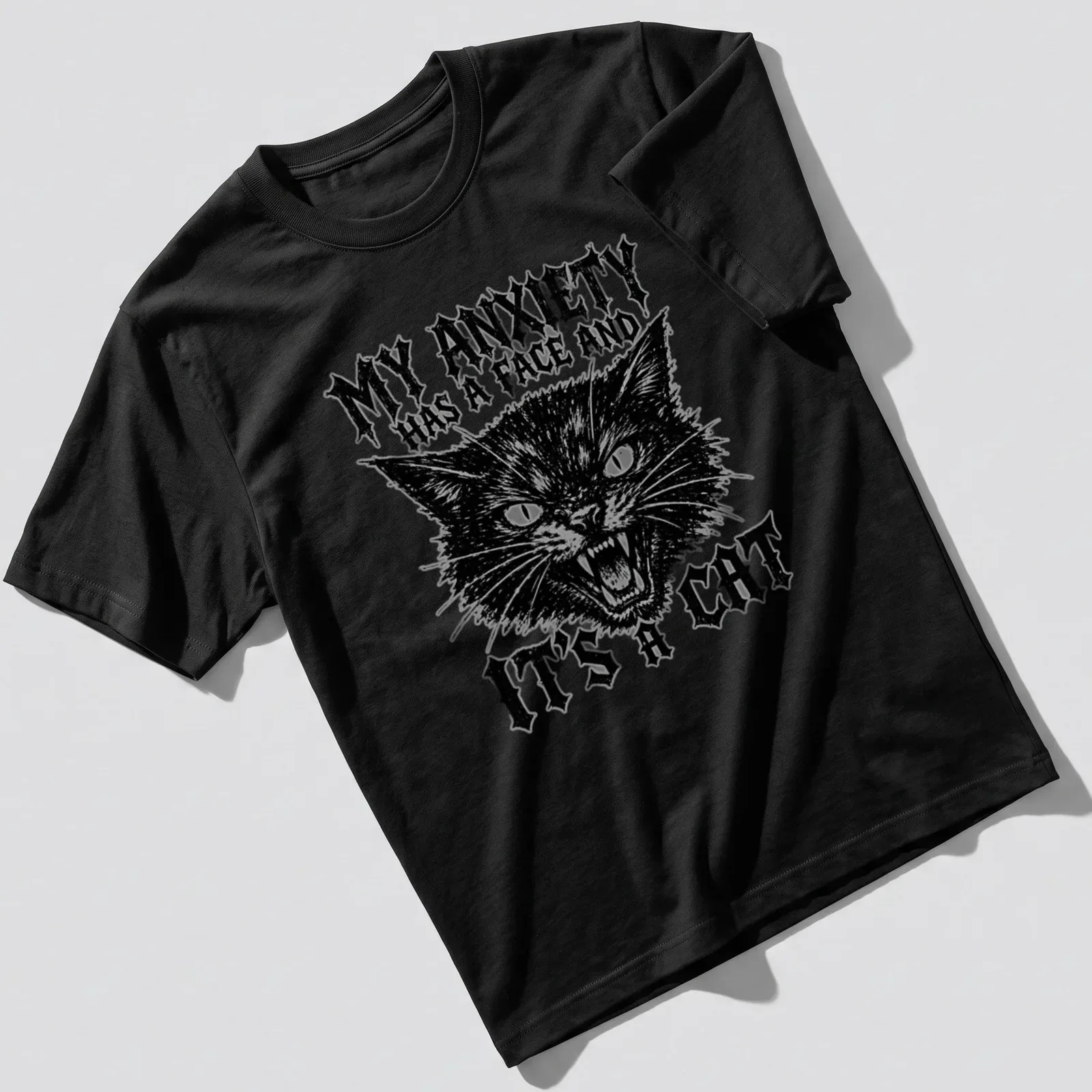 Heavy metal grunge T-shirt featuring a cat and the text about anxiety. — printed on a unisex t-shirt