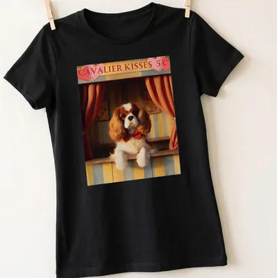 Vintage design featuring a Cavalier King Charles Spaniel wearing a bow tie above the text 'CAVALIER KISSES 5¢' — printed on a women's shirt