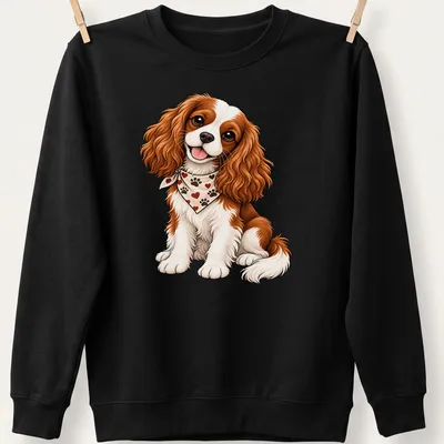 Cartoon Cavalier King Charles Spaniel with playful expression in brown, white, and cream — printed on a unisex sweatshirt