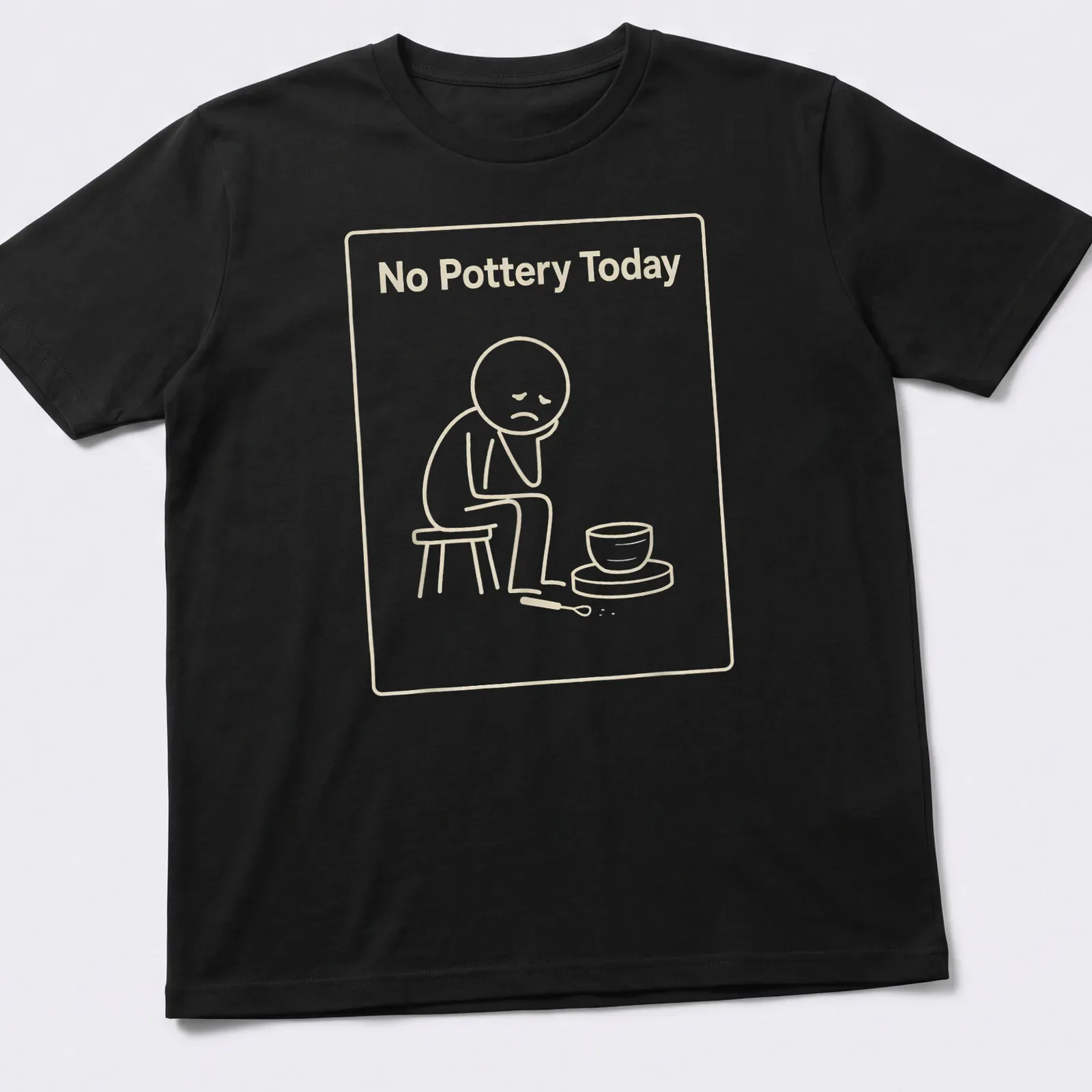 Minimal line art of a sad potter with text No Pottery Today — printed on a unisex t-shirt