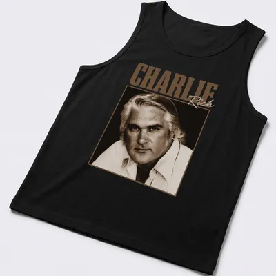 Vintage-style Charlie Rich t-shirt with classic lettering in warm tones — printed on a tank top