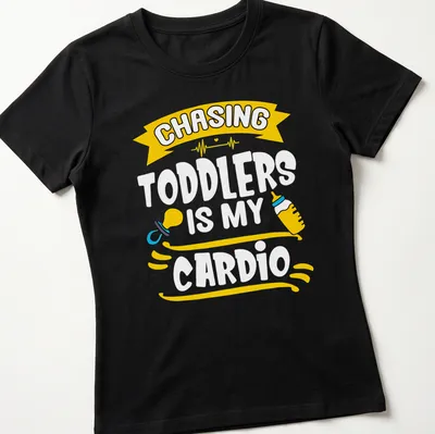 Playful design with text and toddler-related items for parents — printed on a women's shirt