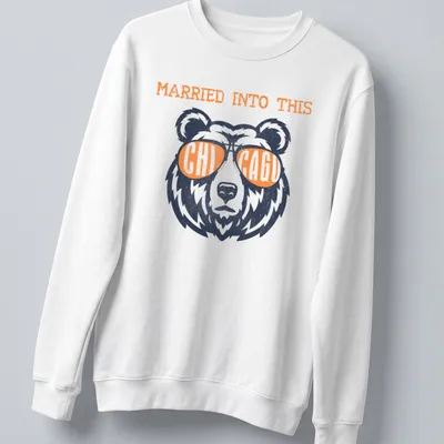Distressed vintage shirt featuring Chicago Bears football bear and text 'Married Into This' — printed on a unisex sweatshirt
