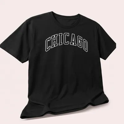 Bold collegiate print of Chicago in black and white on a — printed on a unisex t-shirt (angled view)