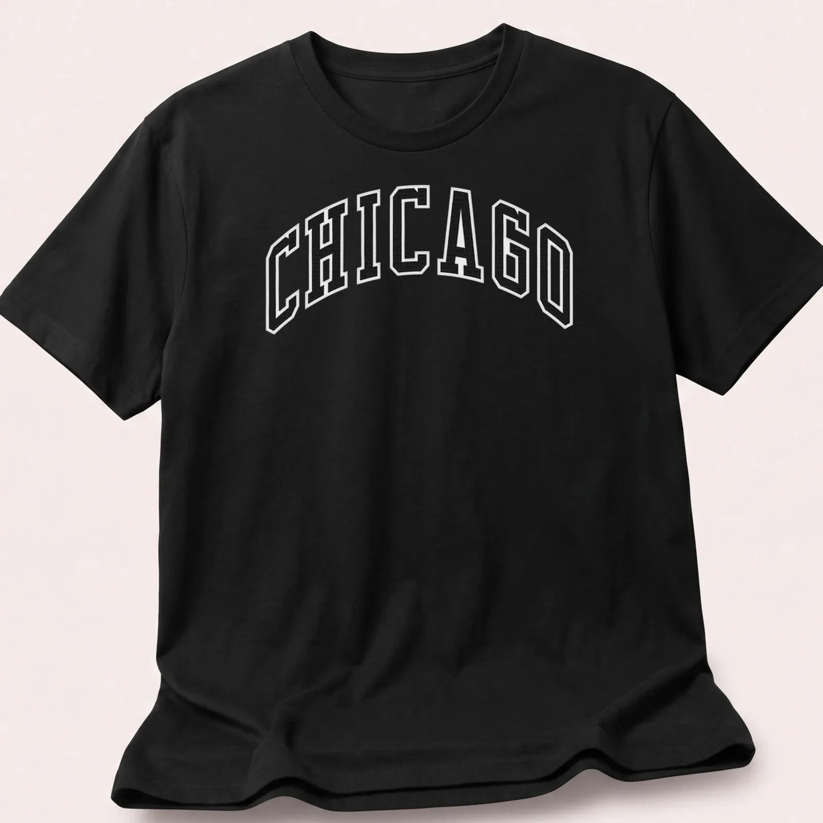 Bold collegiate print of Chicago in black and white on a — printed on a unisex t-shirt