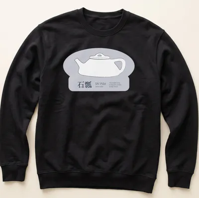 Line art design of a Chinese Zisha clay teapot with detailed text — printed on a unisex sweatshirt