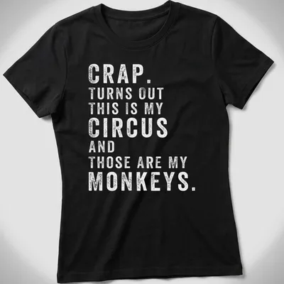 Playful circus-themed t-shirt featuring monkeys and colorful typography — printed on a women's shirt