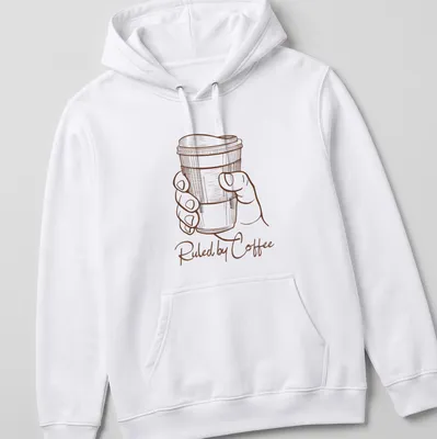 Line art of a hand holding a coffee cup with text 'Ruled by Coffee' in brown and white — printed on a unisex hoodie