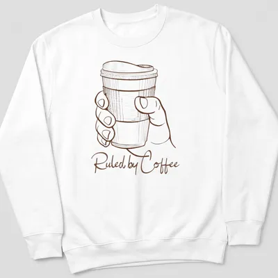 Line art of a hand holding a coffee cup with text 'Ruled by Coffee' in brown and white — printed on a unisex sweatshirt