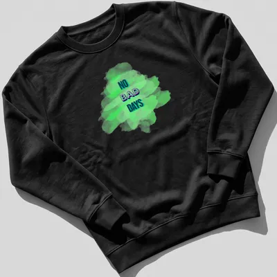 Colorful paint splatter design with the text No Bad Days in an artistic font — printed on a unisex sweatshirt
