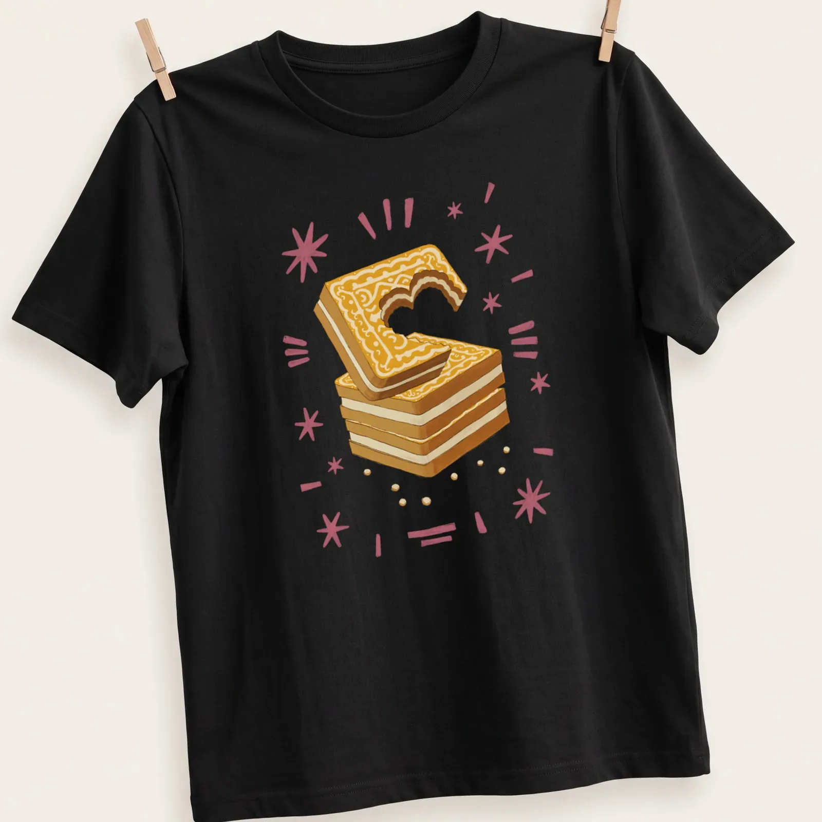 Illustrative Custard Cream Biscuit t-shirt with a heart-shaped bite and vibrant colors — printed on a unisex t-shirt