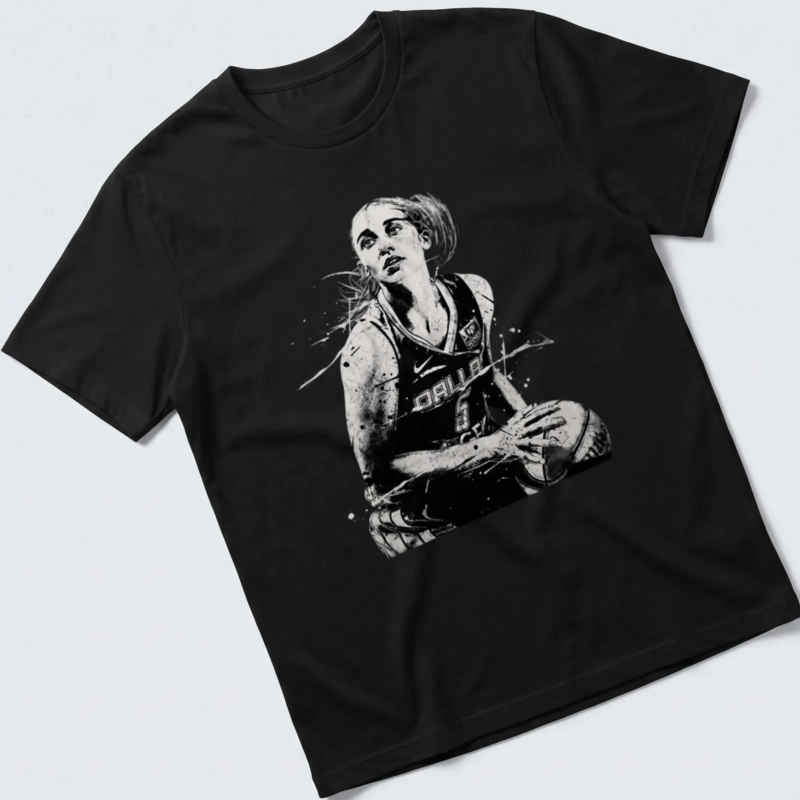 Black and white watercolor print of basketball player Paige Bueckers in action — printed on a unisex t-shirt