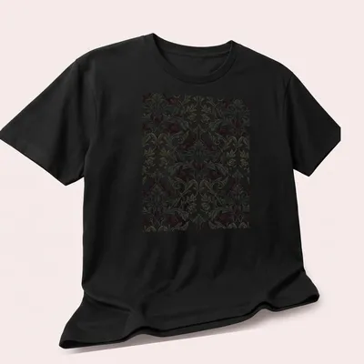 Ornate dark gothic rose damask pattern in red, black, green, and cream — printed on a unisex t-shirt (angled view)