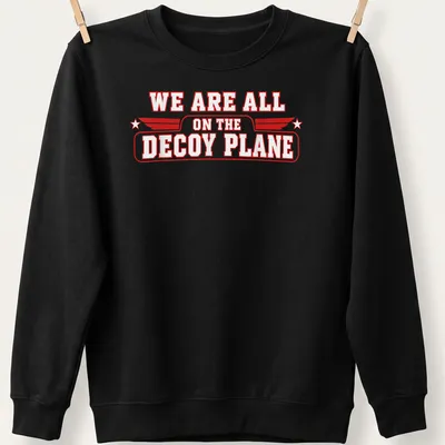 Vintage style t-shirt featuring a decoy plane graphic with bold red and white text. — printed on a unisex sweatshirt