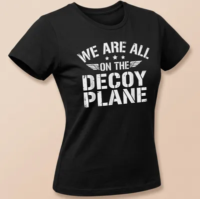 Distressed t-shirt with the phrase 'We Are All On The Decoy Plane' in white — printed on a women's shirt