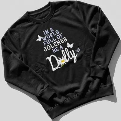 Whimsical design with a daisy and butterflies alongside uplifting text — printed on a unisex sweatshirt