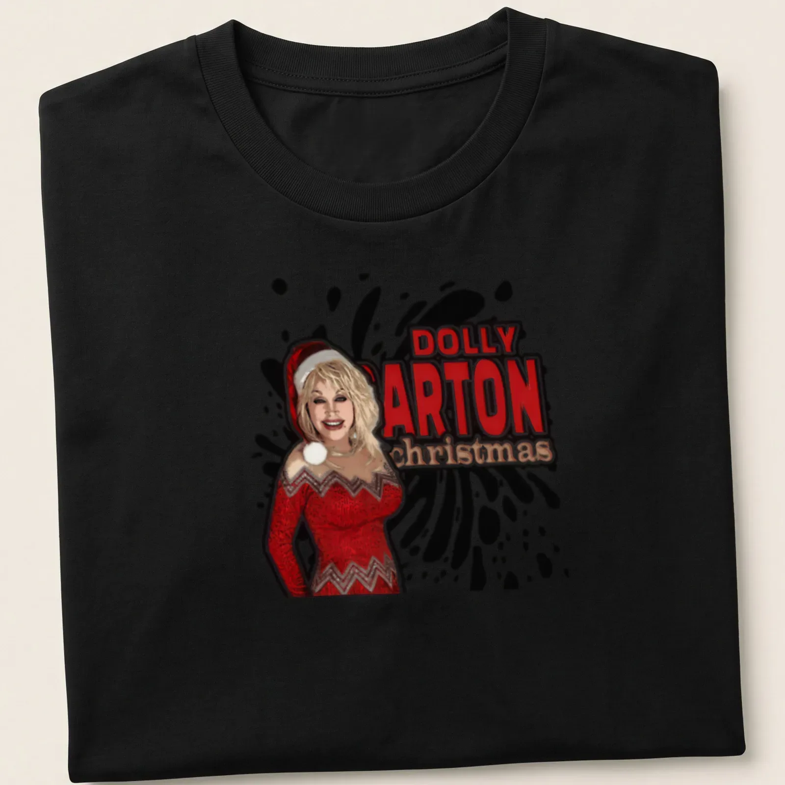 Bold graphic Dolly Parton Christmas T-shirt in red, white, and black — printed on a unisex t-shirt