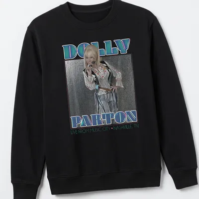 Vintage concert t-shirt featuring Dolly Parton with colorful text — printed on a unisex sweatshirt