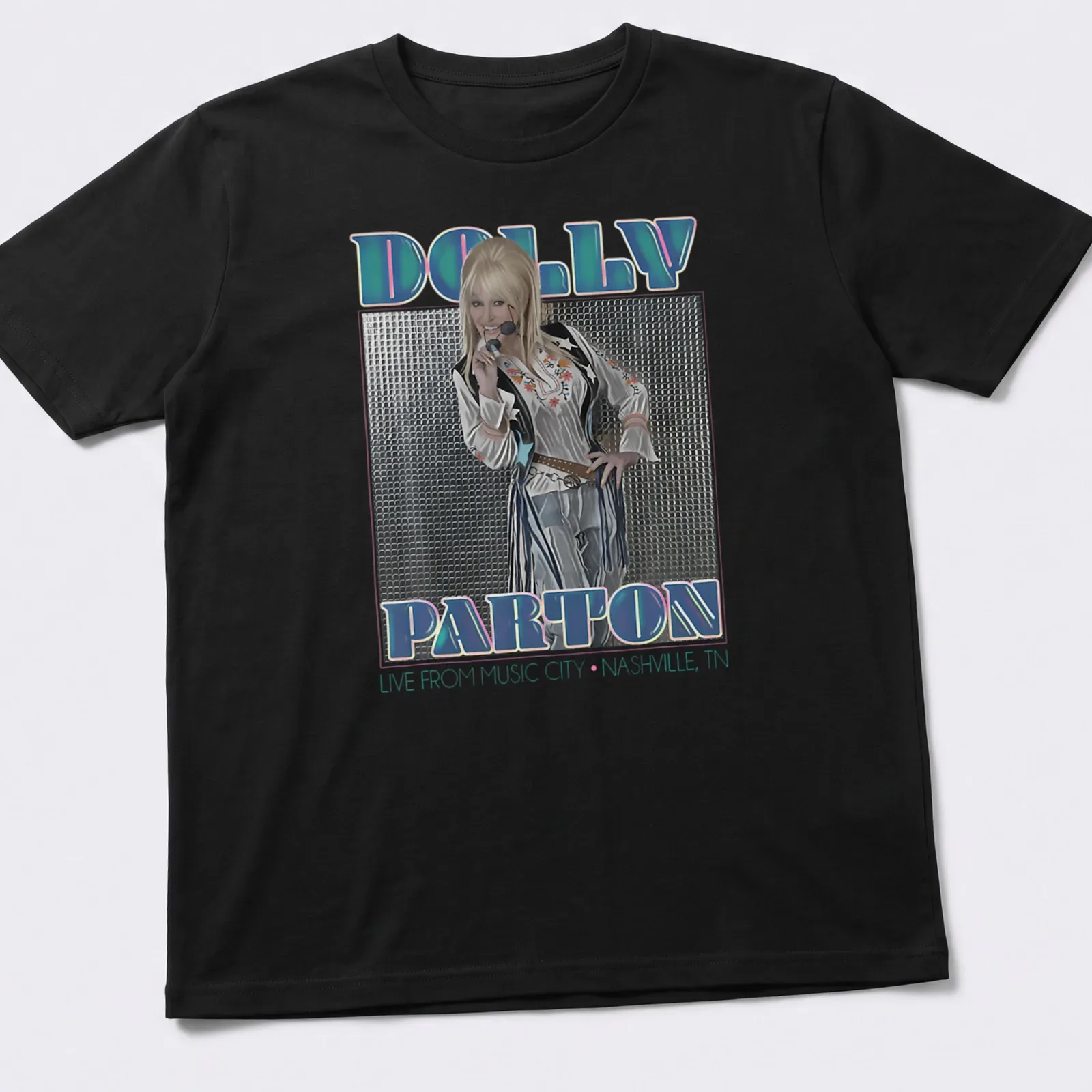 Vintage concert t-shirt featuring Dolly Parton with colorful text — printed on a unisex t-shirt