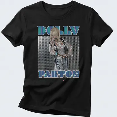Vintage concert t-shirt featuring Dolly Parton with colorful text — printed on a women's shirt