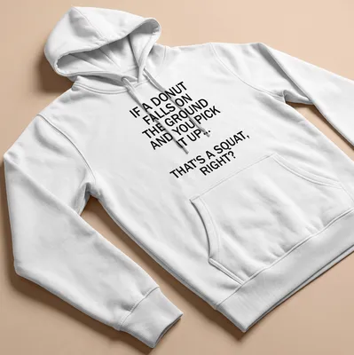 Bold typography shirt with humorous donut squat saying — printed on a unisex hoodie